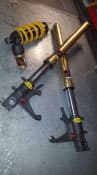Suspension component being serviced
