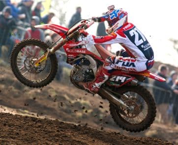 Motocross bike running Rock Oil lubricants
